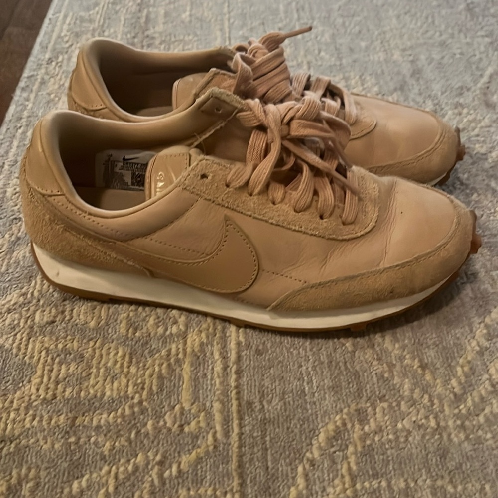Classic Nike in beige suede.